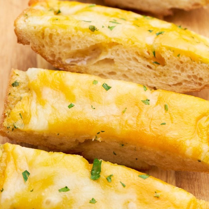 Cheesy garlic bread on sourdough loaf.