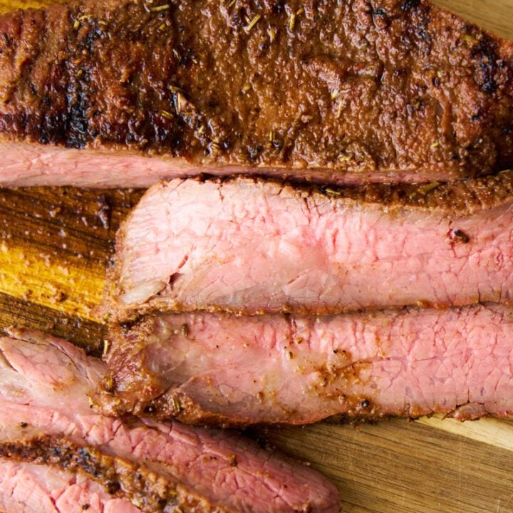 Smoked Tri-Tip on a wooden board.