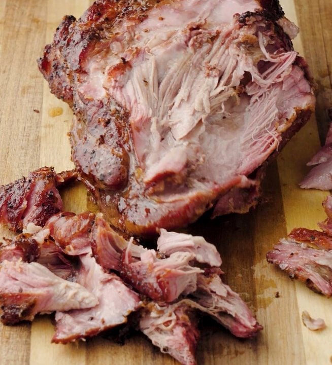 Pernil on a wooden board.
