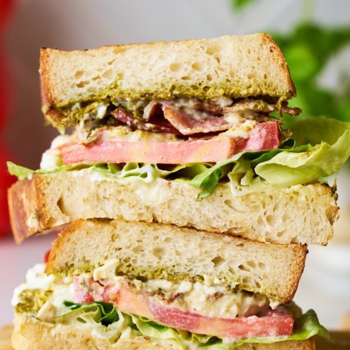 Burrata sandwich with bacon, lettuce and tomatoes.